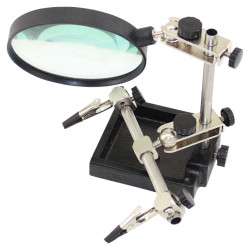 Vertical adjustment articulated support with magnifying glass and clam